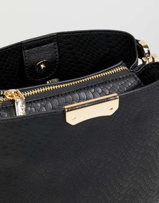 Dune dinidarrow black store cross body bag