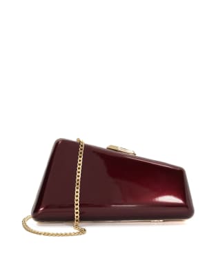 Dune London Balancing clutch bag in burgundy | ASOS