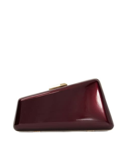 Dune London Balancing clutch bag in burgundy ASOS