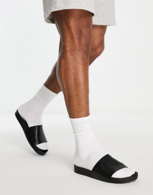 Dune London Fetch sliders in black leather