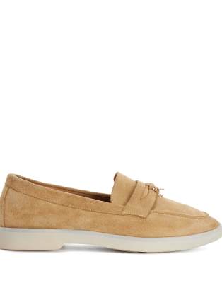  Grinning loafers in sand