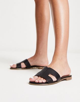 London loopy slip on flat sandals in black