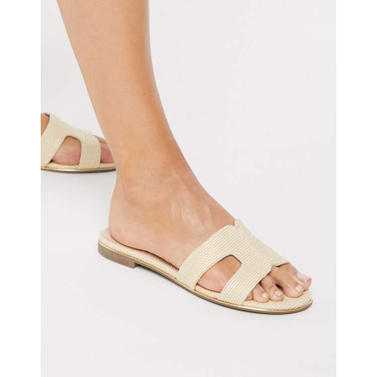 Dune London loopy slip on flat sandals in raffia | ASOS