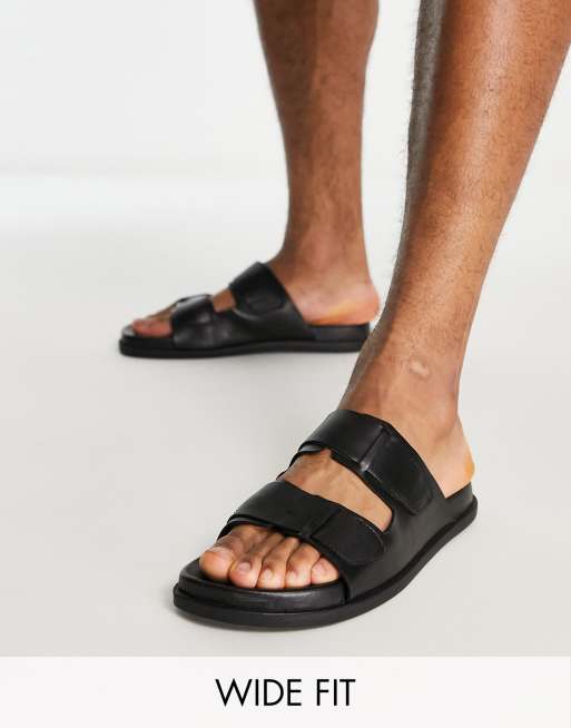 Dune London Wide Fit Folly sliders in black leather