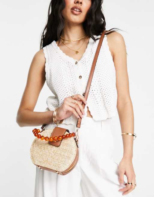 Dune mini circle grab bag in raffia and tan