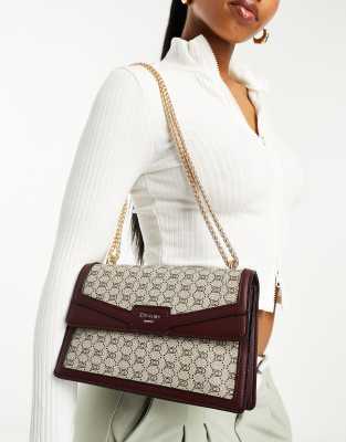 Dune monogram shoulder bag in berry