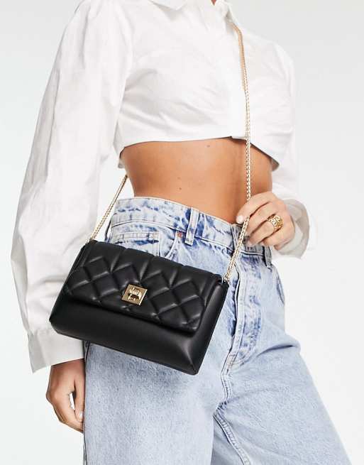 Dune quilted crossbody bag in black ASOS