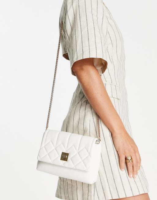 White quilted store crossbody bag