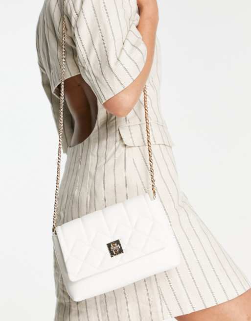 Dune quilted crossbody bag in white