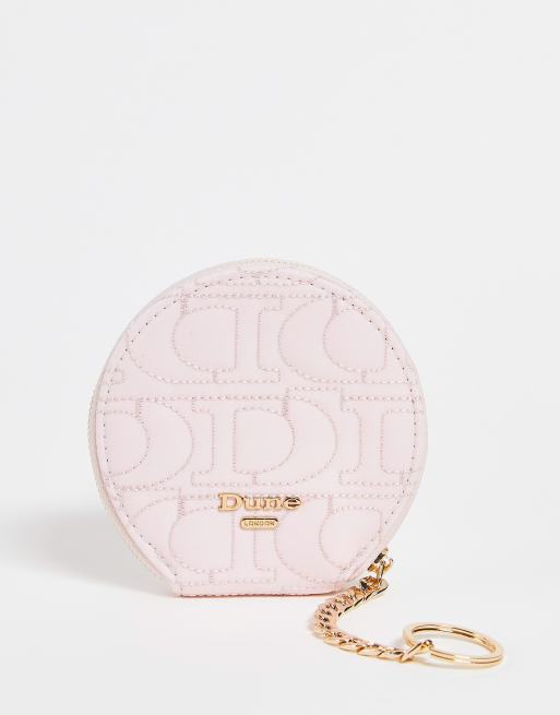 Dune - Rund vatteret crossbody-taske i lyserød