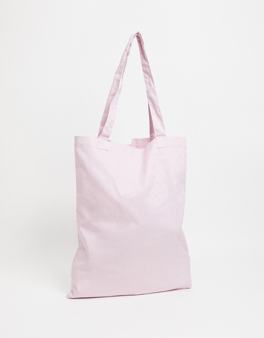 фото Дымчато-розовая сумка-тоут asos design-розовый цвет