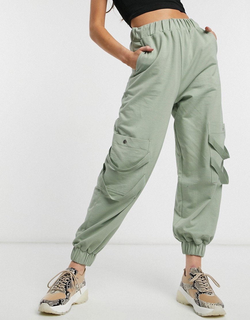 фото Джоггеры с карманами и тесьмой с рисунком \"в елочку\" asos design-зеленый