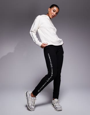 EA7 contrast tracksuit in cream and black with side logo branding