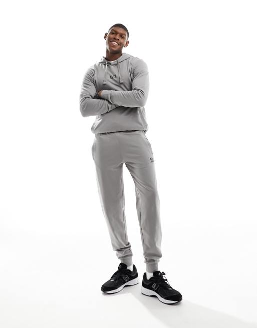 Grey joggers black on sale hoodie