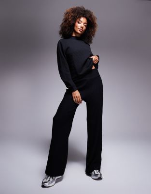 EA7 ribbed wide leg pants in black part of a set