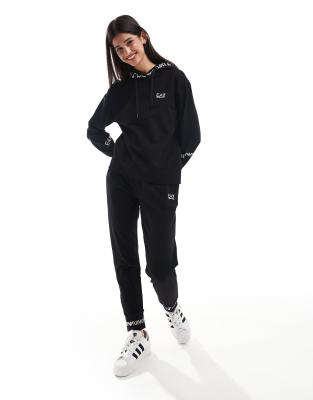 EA7 tracksuit in black ASOS