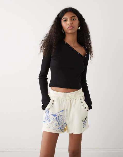 Ed Hardy fighting eagle eyelet sweat shorts in ecru