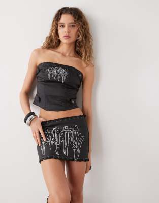Ed Hardy gothic drip braided denim mini skirt in distressed black co-ord