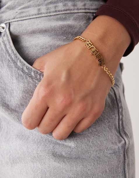 Ed Hardy stainless steel gothic logo bracelet in gold - view 1