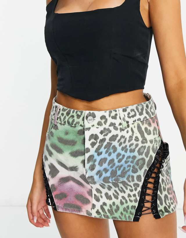 Edikted - 90s denim mini skirt in leopard with lace up detail