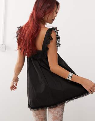 Edikted babydoll smock frill mini dress with white contrast ribbon in black