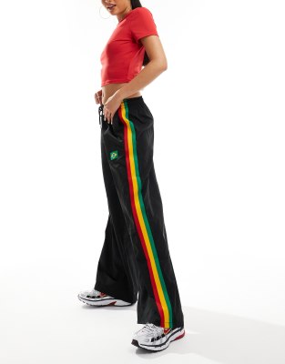 Edikted oversized baggy tracksuit pants with Brazil details Sale