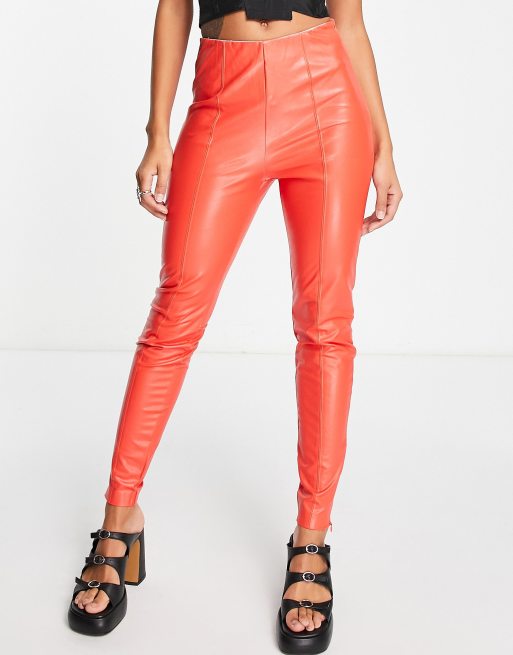 Edited faux leather leggings in bold red