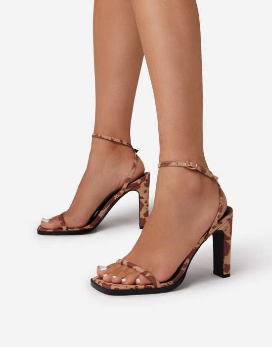 https://images.asos-media.com/products/ego-addyson-heeled-sandals-in-brown-cow-print/201052211-1-browncowprint?$n_550w$&wid=550&fit=constrain
