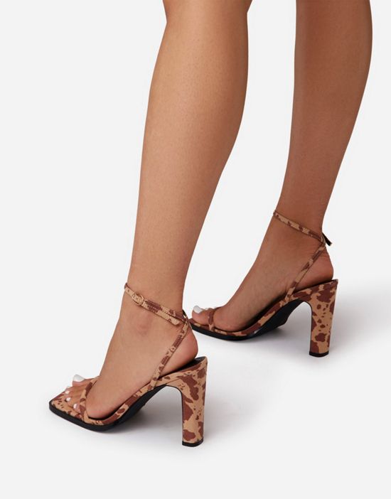 https://images.asos-media.com/products/ego-addyson-heeled-sandals-in-brown-cow-print/201052211-3?$n_550w$&wid=550&fit=constrain
