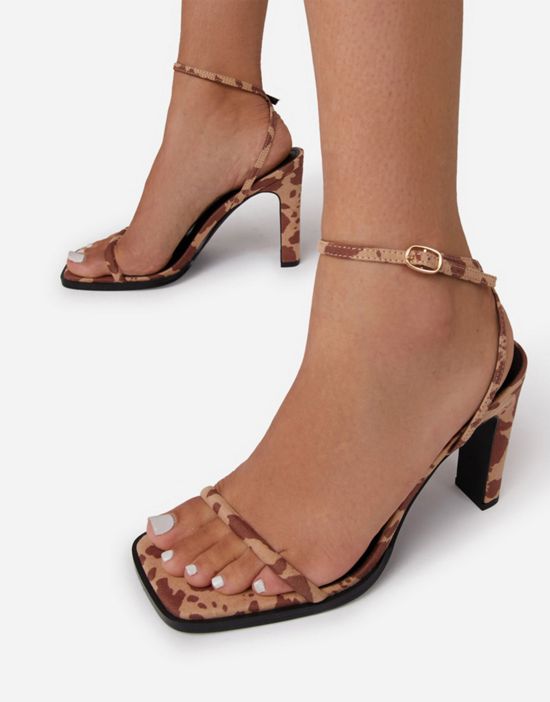 https://images.asos-media.com/products/ego-addyson-heeled-sandals-in-brown-cow-print/201052211-4?$n_550w$&wid=550&fit=constrain