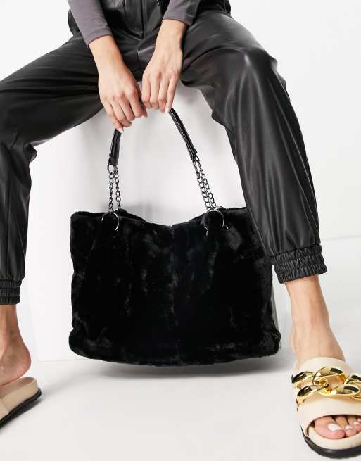 Ego faux faur tote bag in black