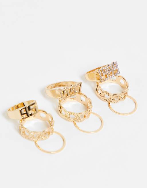 Ego – Guldfärgade ringar i 90-talsdesign med strass, 9-prack 
