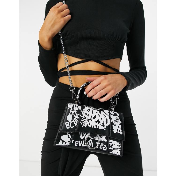 Ego shoulder bag with graffiti print and chain strap in pink