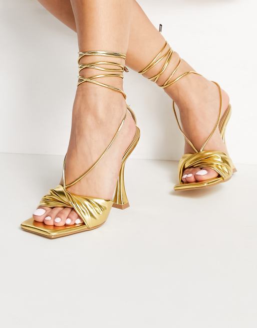 Ego Sassy heel sandals with tie ankle in gold ASOS
