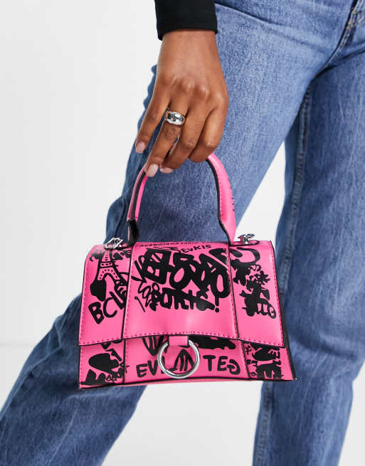 Ego - Schoudertas met graffitiprint en kettingriem in roze