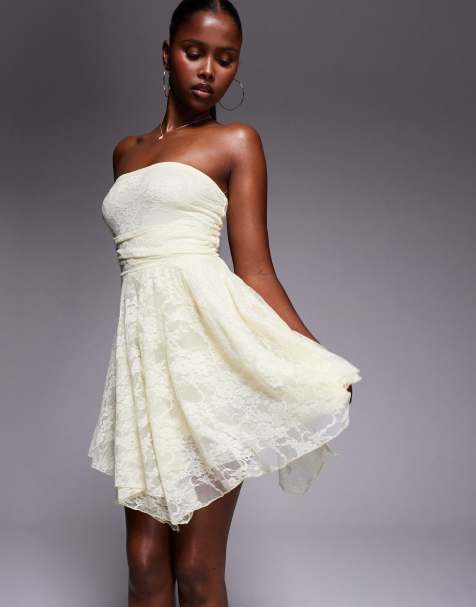 Kaiia exclusive double layered slinky lace bandeau ruffle fairy asymmetric hem lace dress in lemon