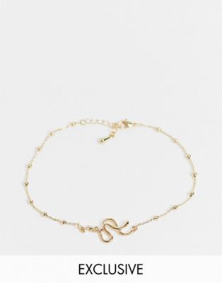 фото Эксклюзивный золотистый браслет на ногу с подвеской-змеей designb london-золотой