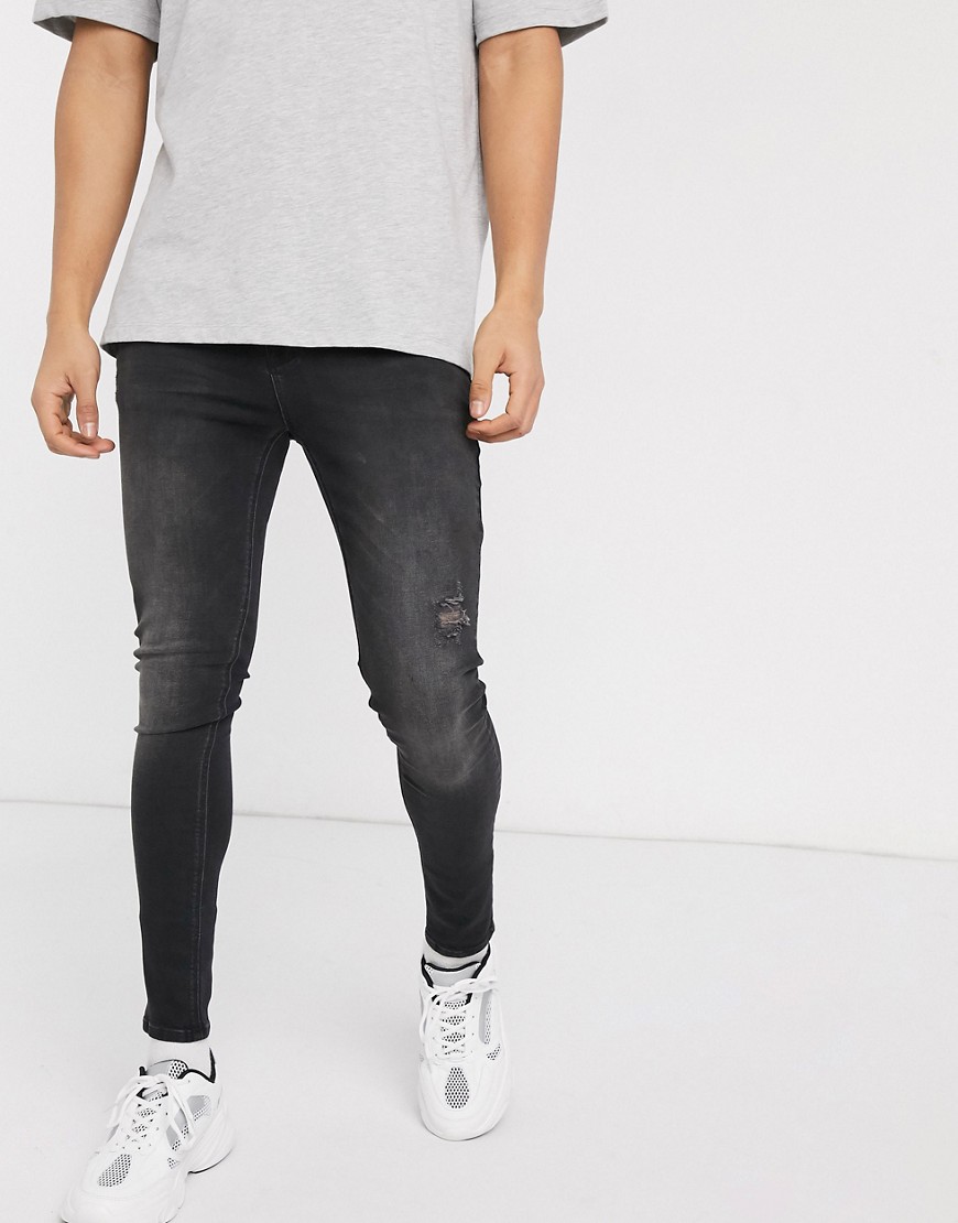 фото Эластичные рваные джинсы черного цвета с необработанным низом asos design-черный