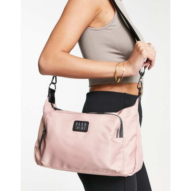 ELLE Sport front pocket shoulder bag in pink