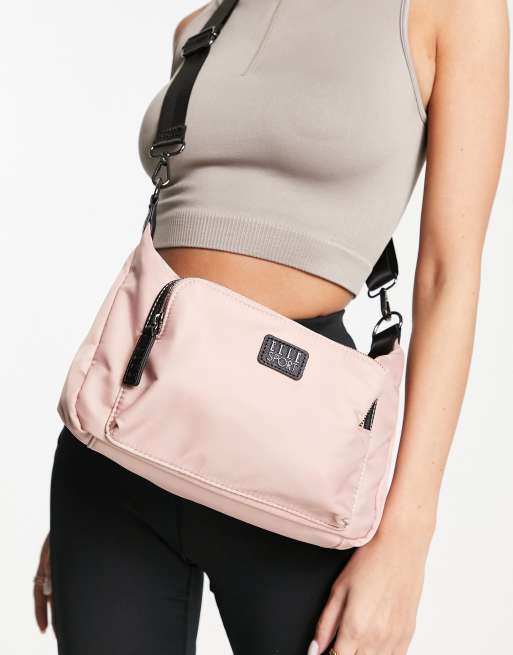 ELLE Sport front pocket shoulder bag in pink ASOS