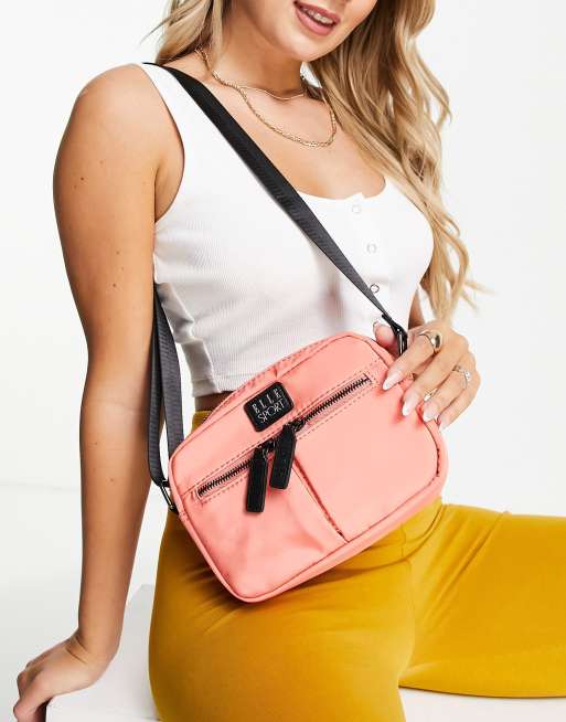 Elle Sport nylon two pocket crossbody bag in coral pink