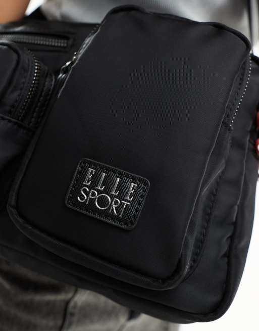 ELLE Sport utility pocket crossbody bag in black ASOS