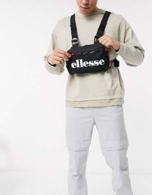 ellesse Aruga chest bag in black | ASOS