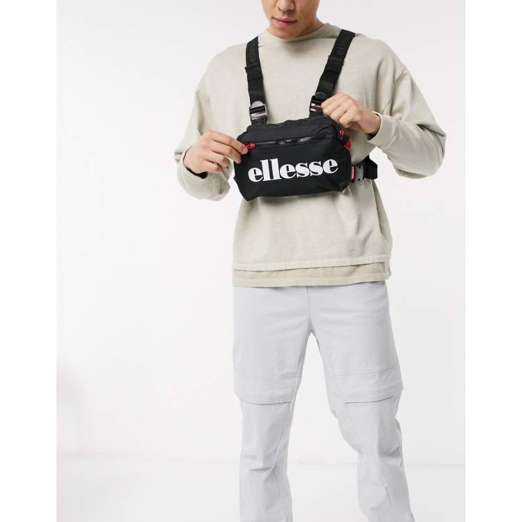 Makkelijk te begrijpen het formulier partner ellesse Aruga chest bag in black | ASOS