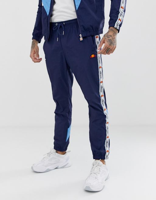 ellesse tracksuit with white taping in navy ASOS