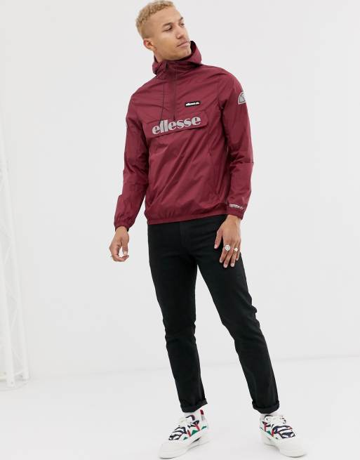 ellesse Berto 2 half zip jacket with reflective detail in burgundy