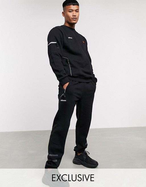ellesse Carl sweatpant with reflective stripes in black exclusive at ASOS
