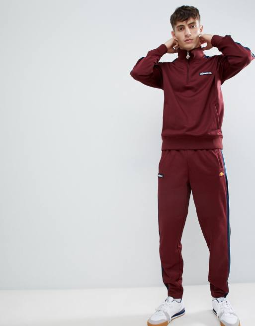 ellesse Cassed sweatpants with taping in burgundy