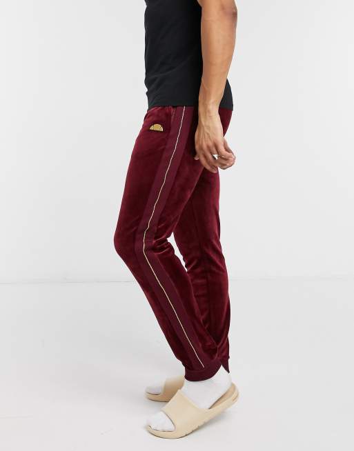 ellesse Cenone metallic logo velour jogger in red ASOS