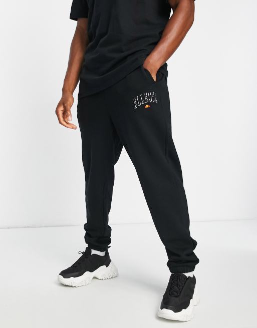 ellesse collegiate trackies in black